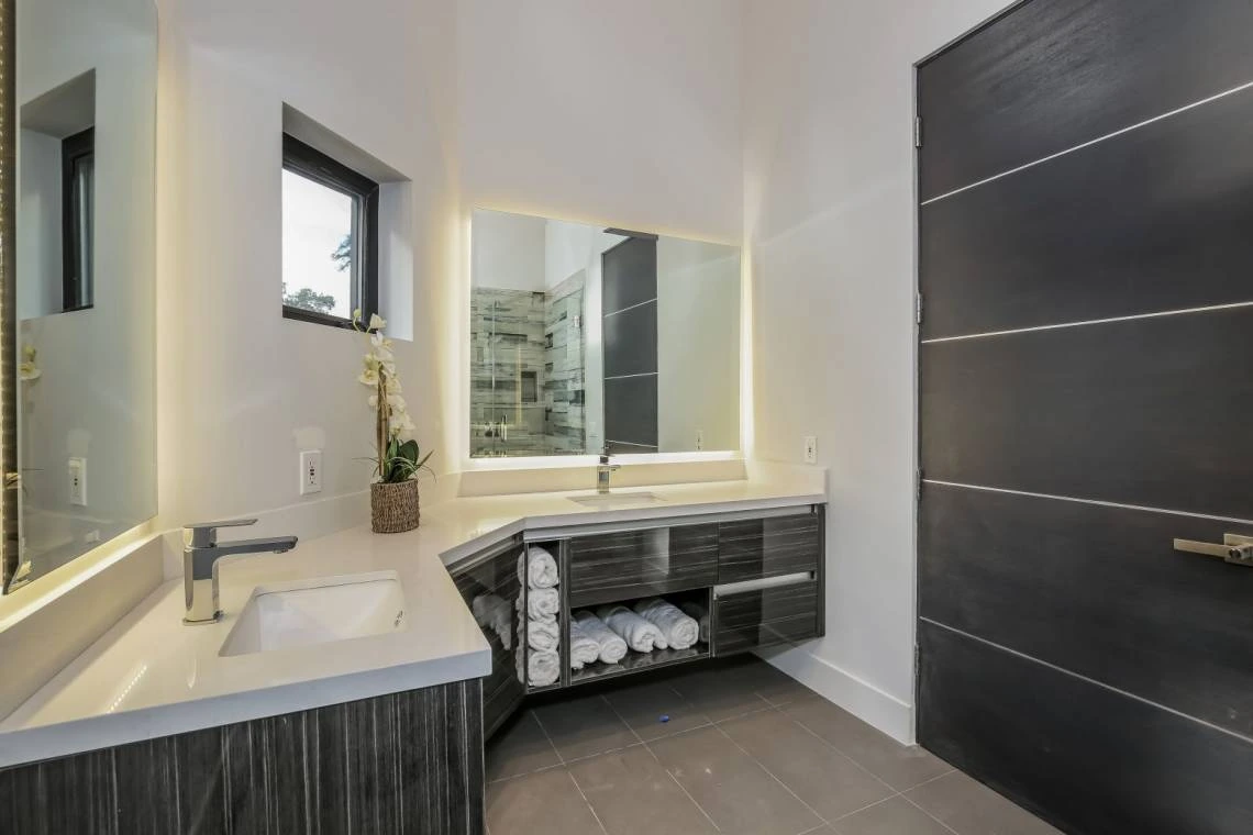 BATHROOM REMODELING · GLASS SHOWER & VANITY